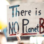 Environmental protest with sign "There is no Planet B"